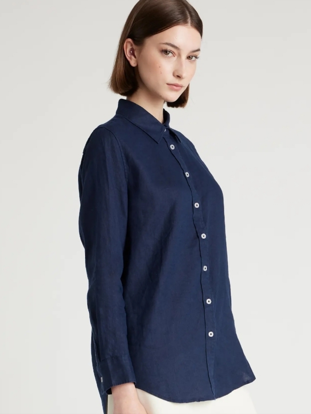 Quince Navy Button-Up Shirt with Orange Logo
